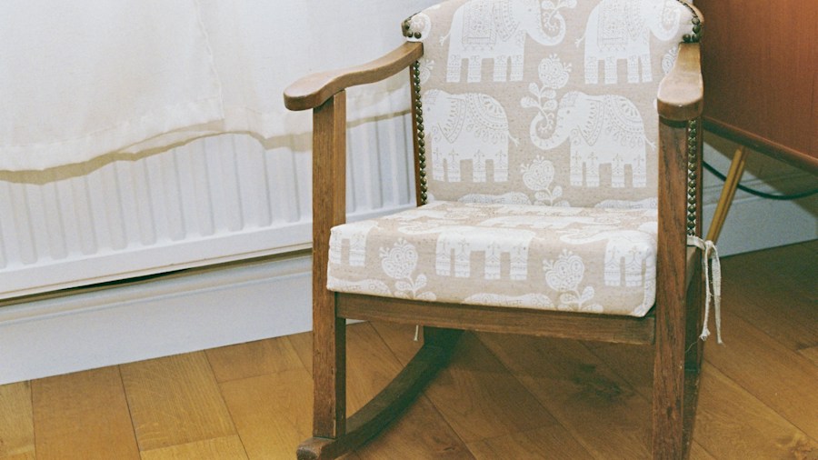 Designer Reveals How Statement Curtains Set the Tone for Your Entire Home 1 blue accent chair patterned fabric room