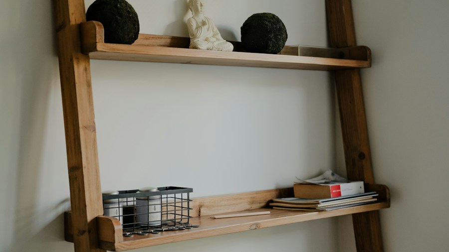 books candles plants ladder shelf styling