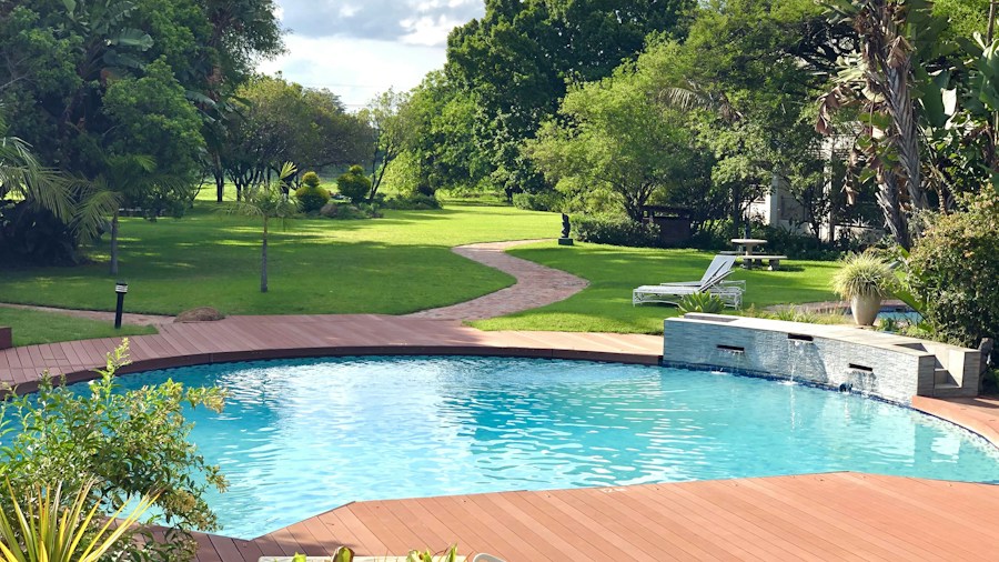 circular swimming pool garden plants