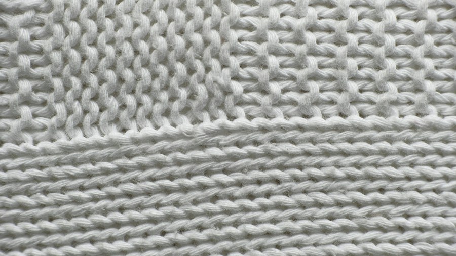 7 Tips for Choosing the Right Pillow for Better Sleep 2 closeup of pillow cover texture and material