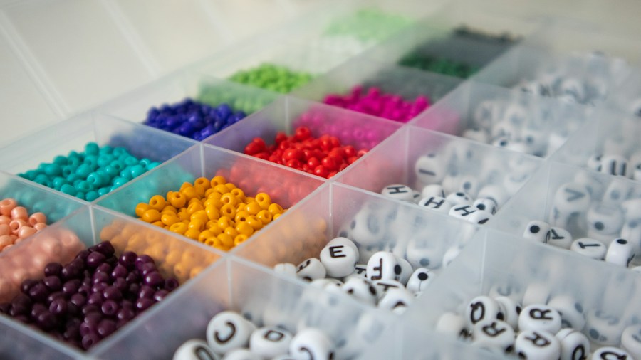 DIY Beaded Pendant Light Project Takes Off: What Home Decorators Should Know 1 colorful beads on pegboard arranged