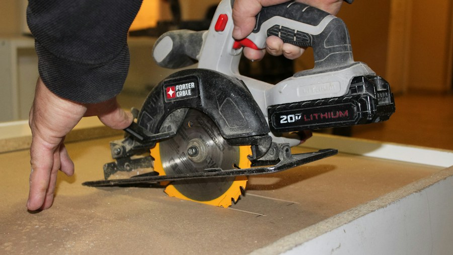 Home Depot Free Tool Promotion on Milwaukee M12 Circular Saw and More Explained 1 compact circular saw cutting wood sheet