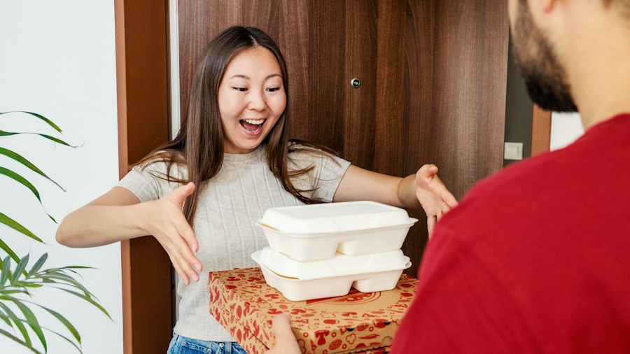 customer receiving delivery at home