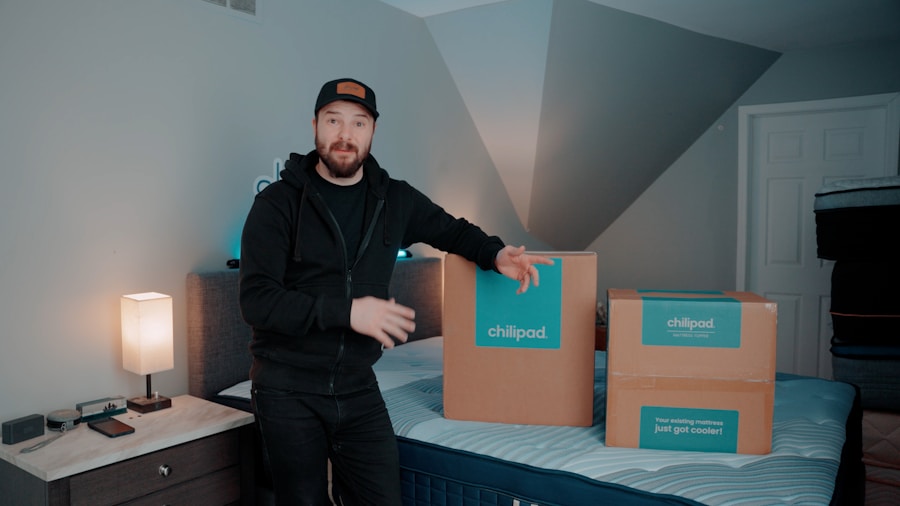 Saatva Labor Day Sale 2024: 20% Discount on Premium Mattresses and What Shoppers Should Know 2 delivery workers setting up mattress in bedroom