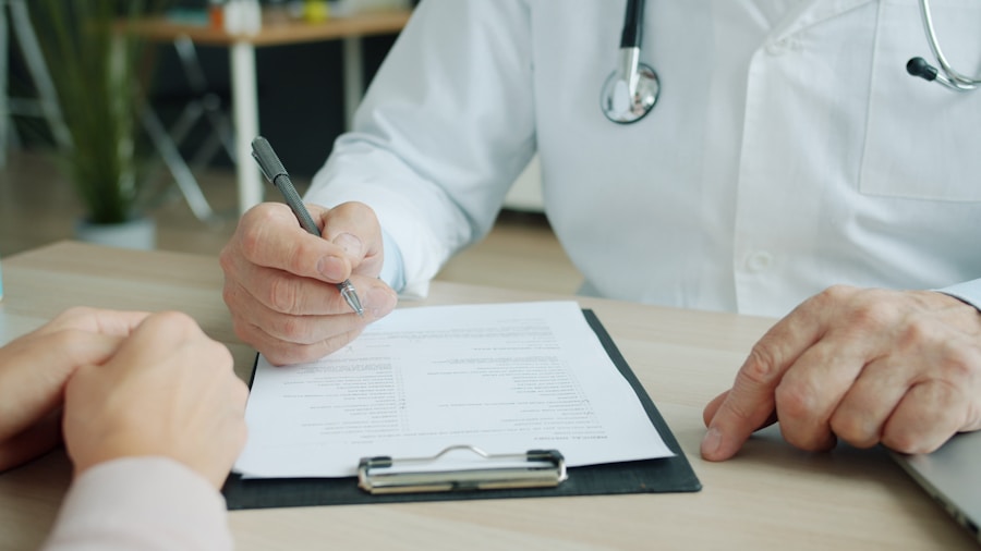 Daybreak Joins National ePrescribing Platform: What Sleep Apnea Shoppers Should Know 1 doctor reviewing medical records
