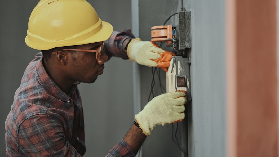 Klein Tools Releases New Voltage Tester with Smart Detection Display 2 electrician using testing equipment