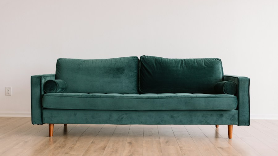 emerald green velvet sofa