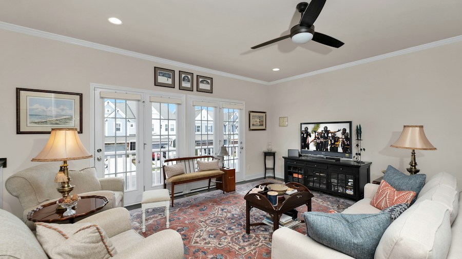 family room with fresh paint and lighting