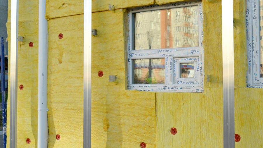 7 Essential Tips for Choosing and Installing Garage Insulation 1 fiberglass insulation batts between wall studs