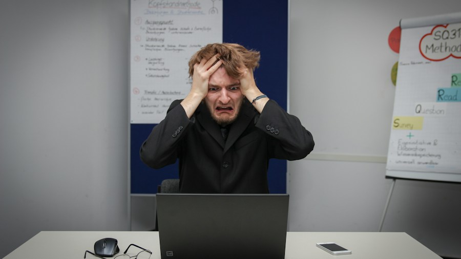 frustrated person at computer