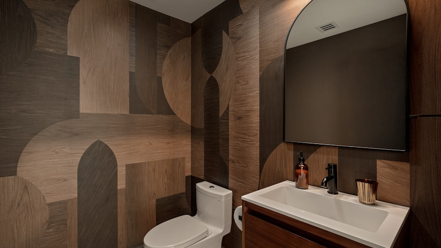 Homeowner Skips Wallpaper and Uses Custom Stenciling to Transform Bathroom for Under 100 Dollars 2 hand painted stencil accent wall