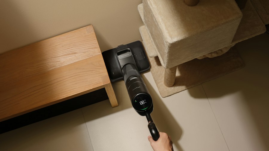 hand vacuuming mattress surface