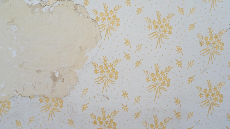 homeowner peeling wallpaper off wall