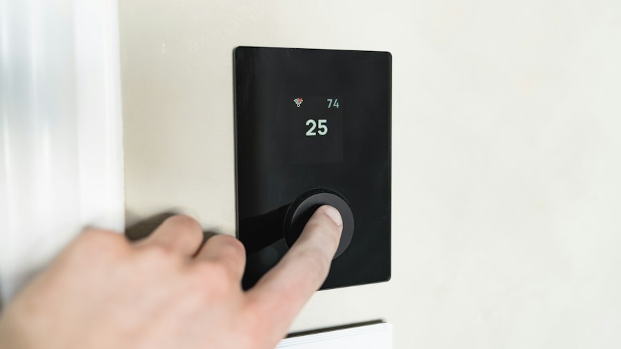 Apple's Smart Thermostat Launch Reshapes the Industry: What Buyers Should Know 2 HVAC contractor installing wall thermostat