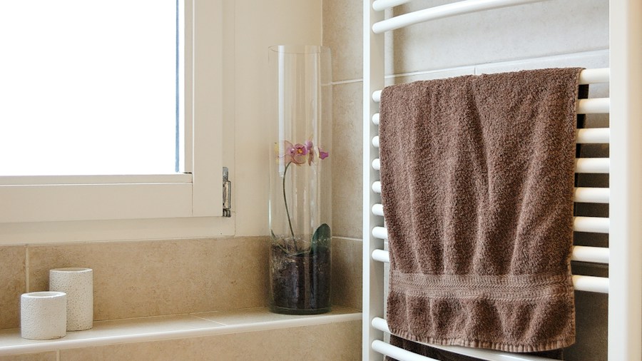 IKEA STEGESUND Towel Stand Launches: What Shoppers Should Know About This Bathroom Storage Upgrade 1 minimalist bathroom towel rack organization