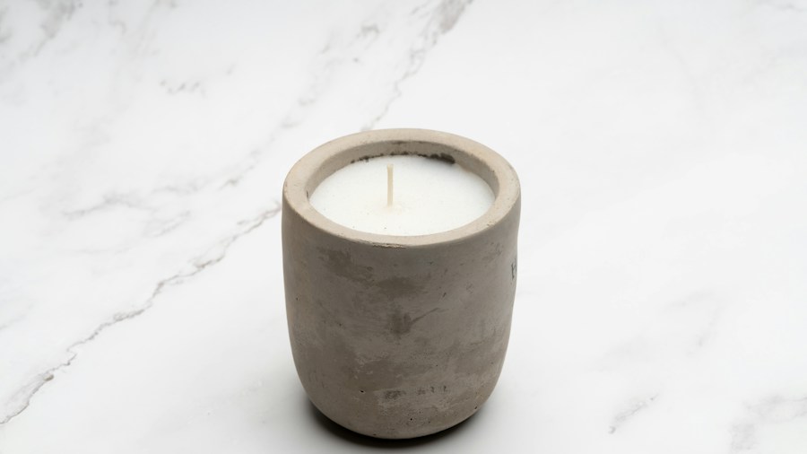 Candles Are Becoming Dining Table Centerpiece Art: What Shoppers Should Know About the Design Revolution 2 modern concrete candle vessel