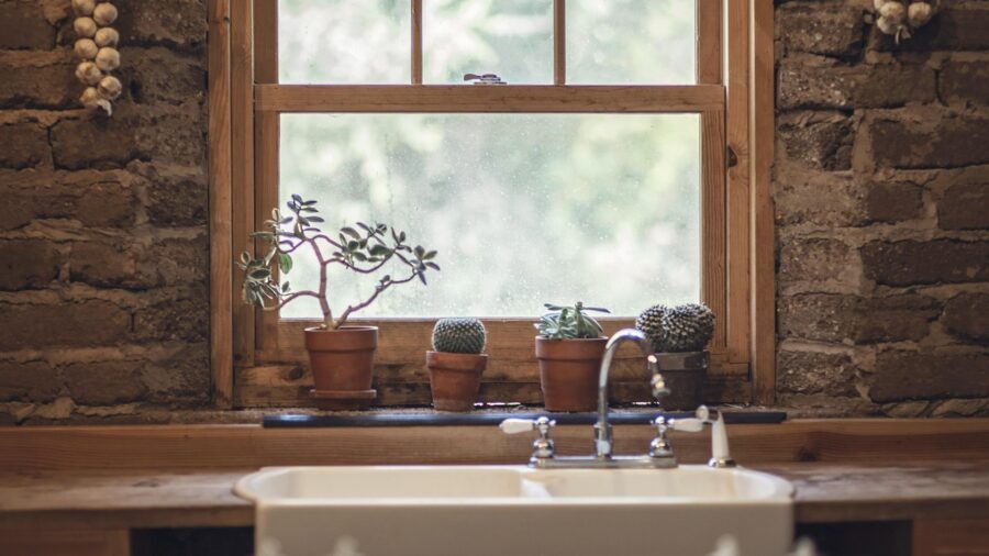 Designer Reveals How Statement Curtains Set the Tone for Your Entire Home 2 modern kitchen with colorful walls and natural light