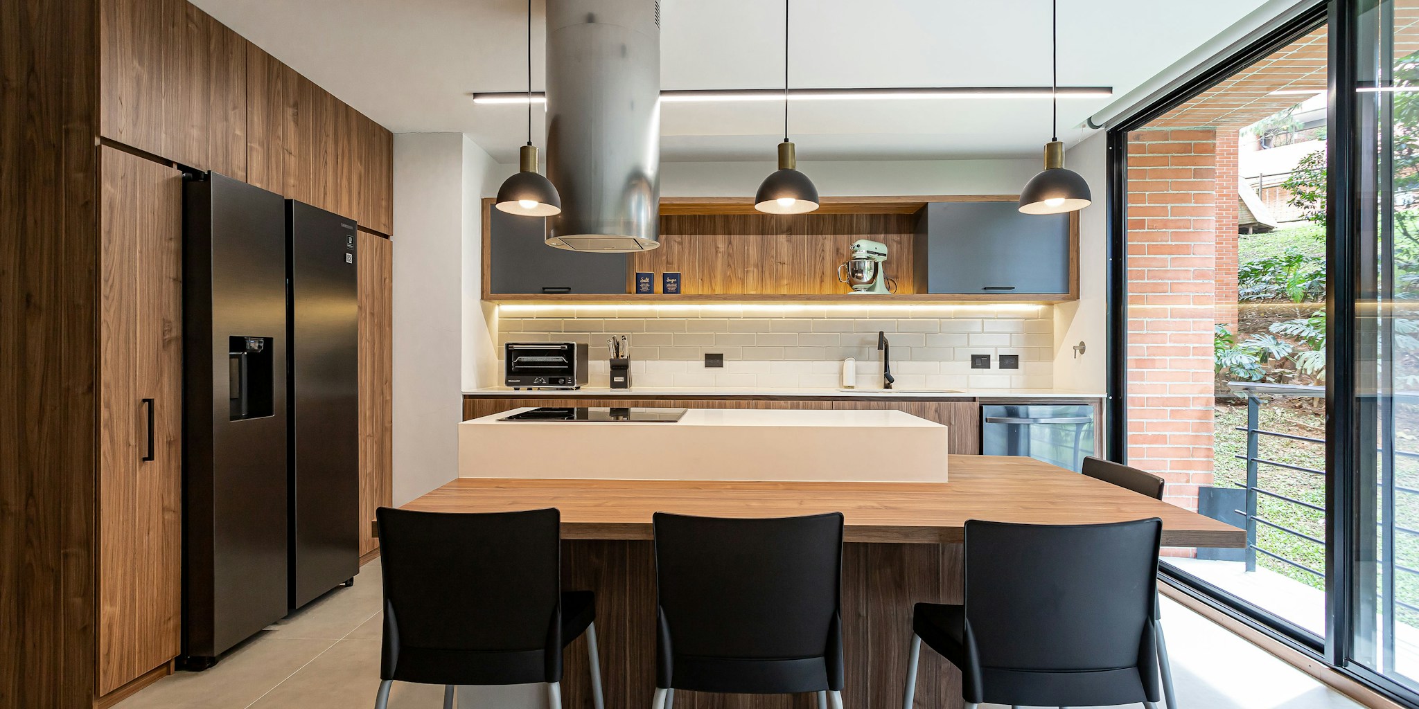 Kitchen Furniture and Decor Trends Transform Cooking Spaces Into Comfortable Living Rooms