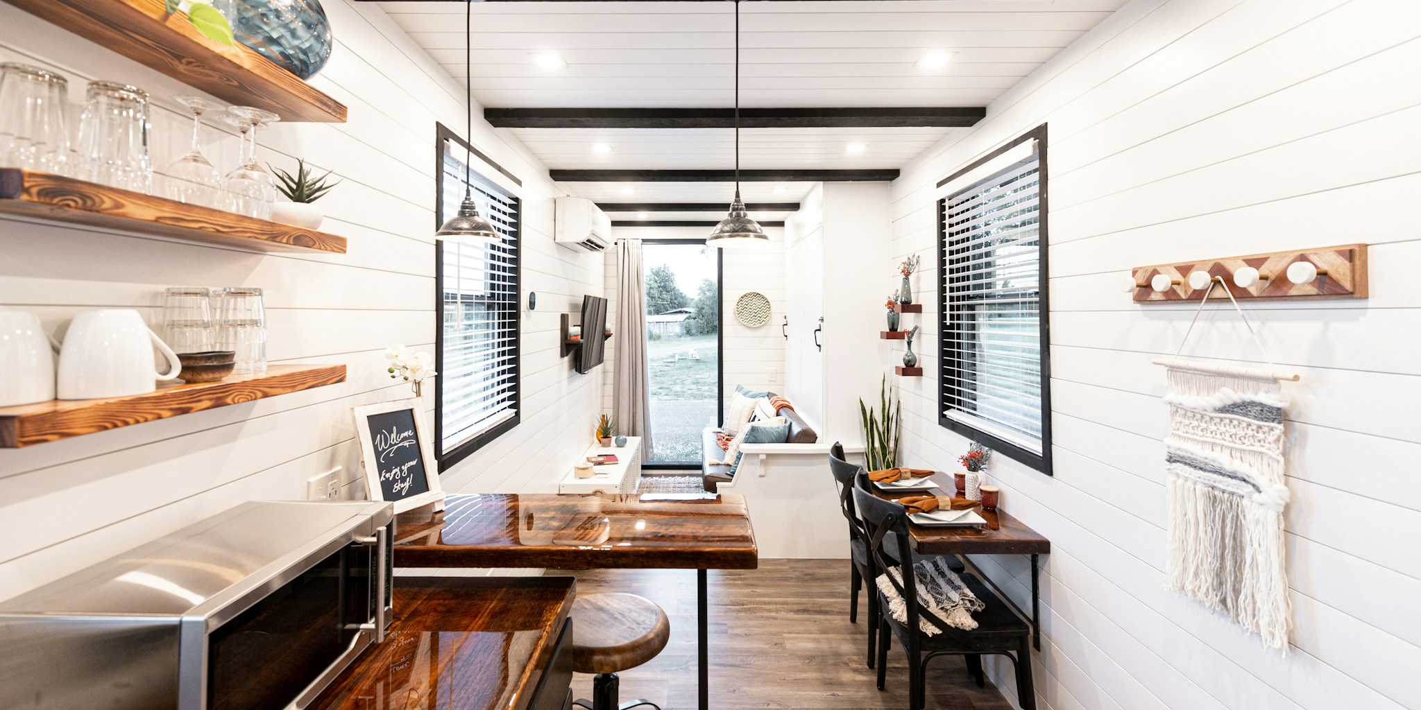 Tiny Home with Murphy Sofa Sleeping Option Changes What Buyers Should Know About Micro Living