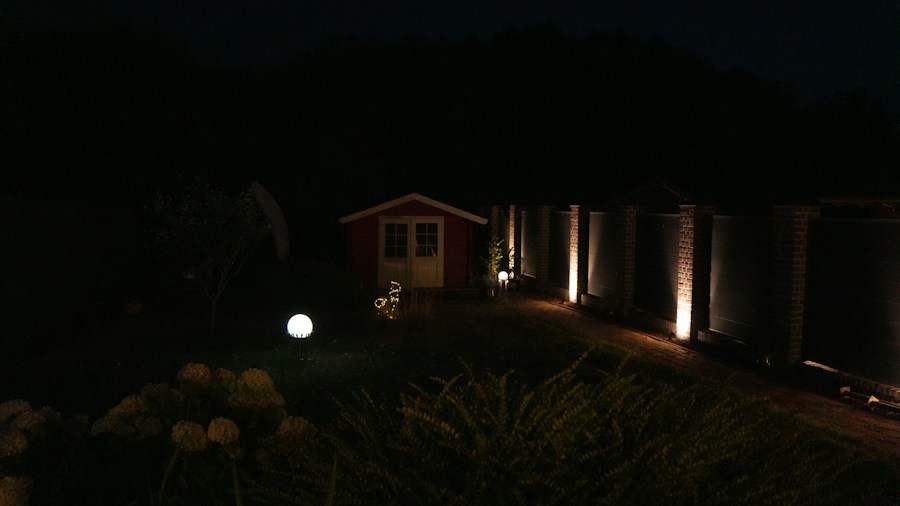 nighttime backyard with security lights