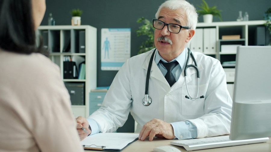 Major Survey Reveals Sleep Apnea Crisis Hidden Among Parents of Young Children 1 parent talking doctor office