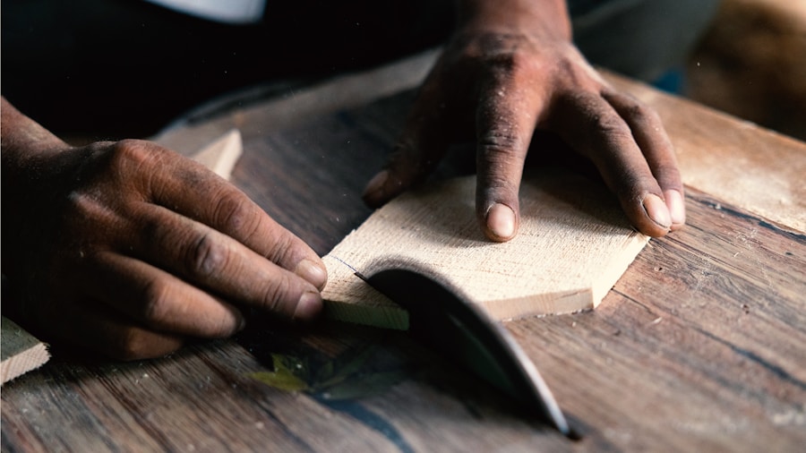 person scoring wallpaper with knife