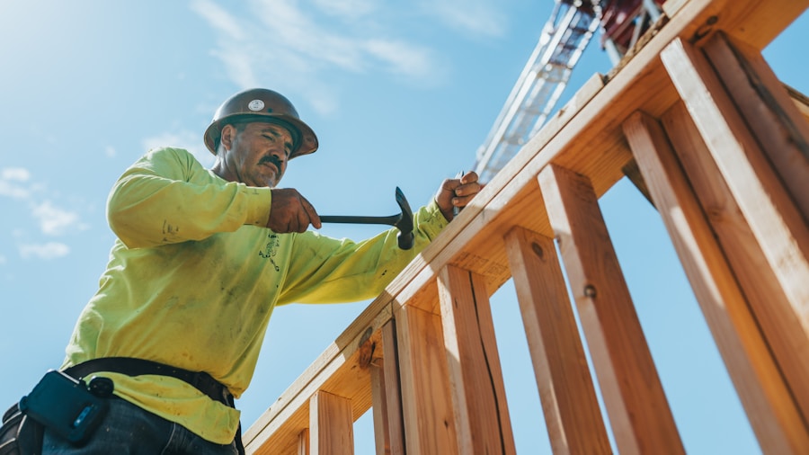 person using cordless drill construction site