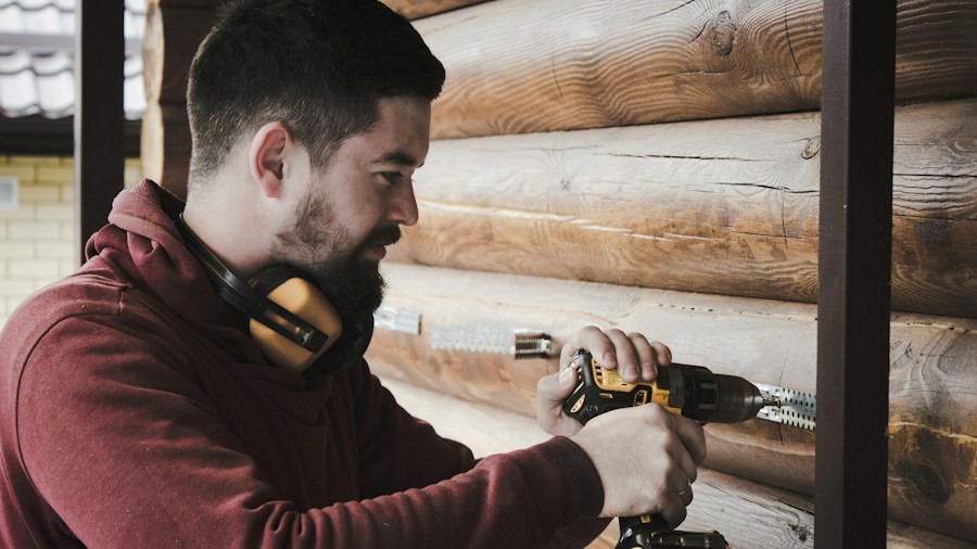 professional using impact driver