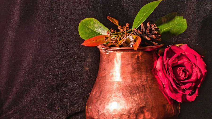 Victorian Fan Vases Return to Interior Design: What Shoppers Should Know 2 roses and ferns in decorative vase