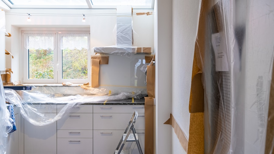Dark Paint Color Defies the Rules and Makes a Small Kitchen Feel Twice as Big 2 small kitchen renovation paint