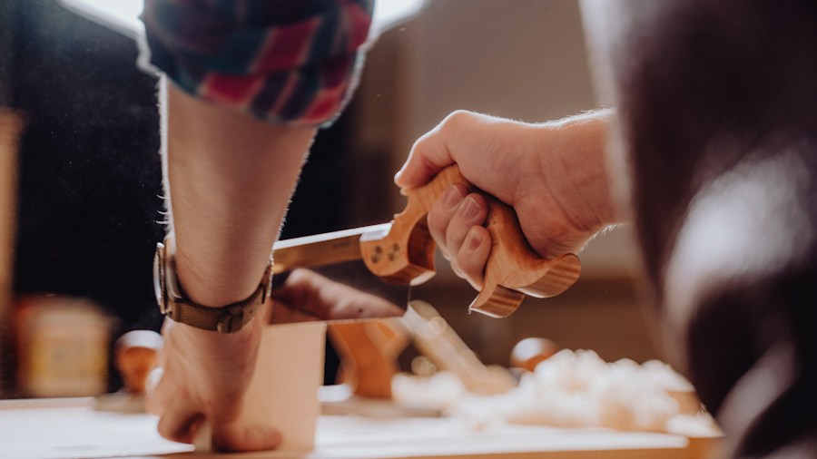 Bosch Delivers Power Sanders to High School Woodworking Program: What Shoppers Should Know 2 students working wood projects