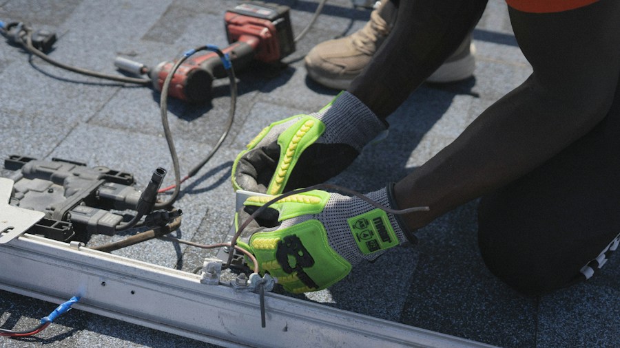 technician installing AC system