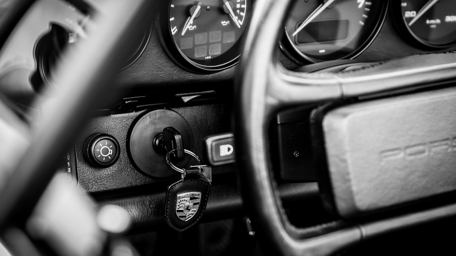 $30,000 Porsche-Inspired Sofa With Built-In Minibar What Buyers Should Know 1 vintage Porsche sports car interior detail