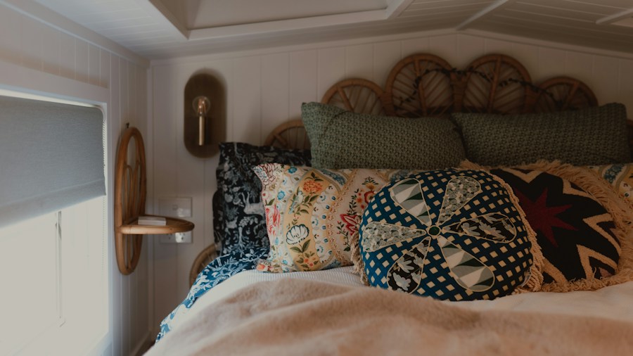 Vintage RV Gets Stunning Makeover Using Retro Wallpaper and Glam Decor: What Shoppers Can Learn 1 vintage trailer bedroom decor