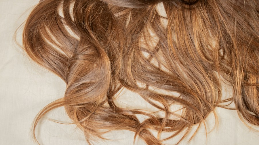 5 Daily Habits Turning Your Pillow Yellow and How to Fix Them 2 wet hair drying before bed
