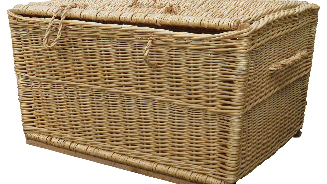 Thrifted Picnic Baskets Replace Plastic Storage Under Your Bed