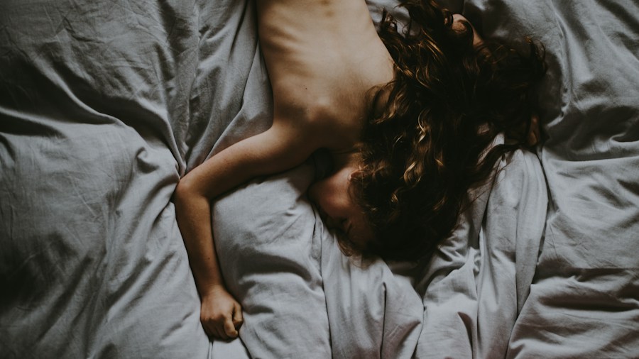 Bearaby Tree Napper Weighted Blanket Review: What Shoppers Need to Know About Premium Cooling Options 2 woman sleeping cool bed neutral tones