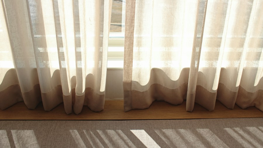 Leather Curtain Rod Holders Offer a Rustic Alternative to Boring Brackets 1 wooden dowel curtain installation